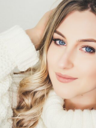 woman wearing white sweater closeup photography